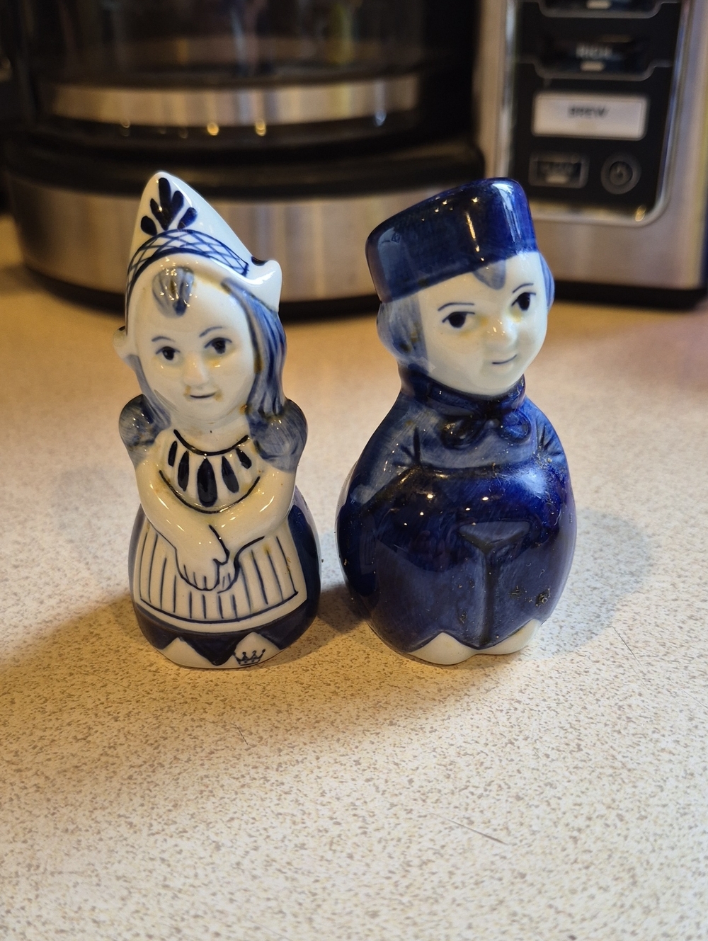 Delft Blue and White Delft-Style Porcelain Figurine Pair